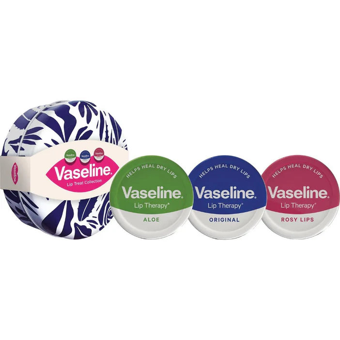 Four Vaseline lip balm containers in different flavors on a white background