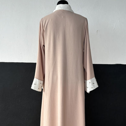 Elegant NED collar dress adorned with sparkling rhinestones for a sophisticated, stylish evening look.