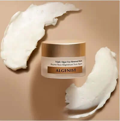 Algenist Triple Algae Eye Renewal Balm jar with balm texture on a beige background.