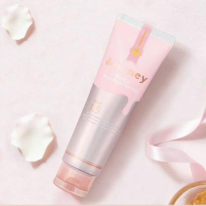 Skincare product with pink and silver design on a light pink background