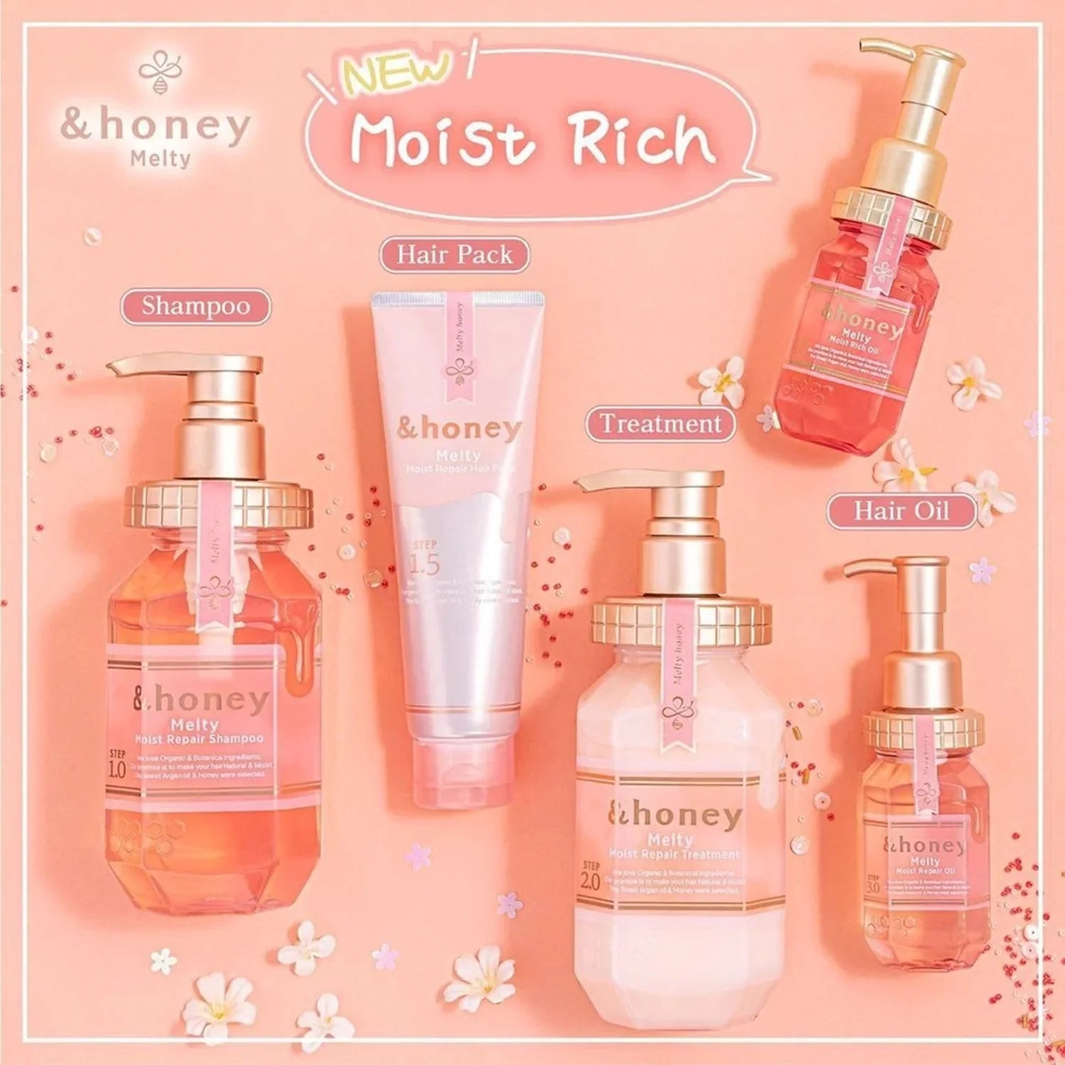 Set of &honey hair care products on a pink background