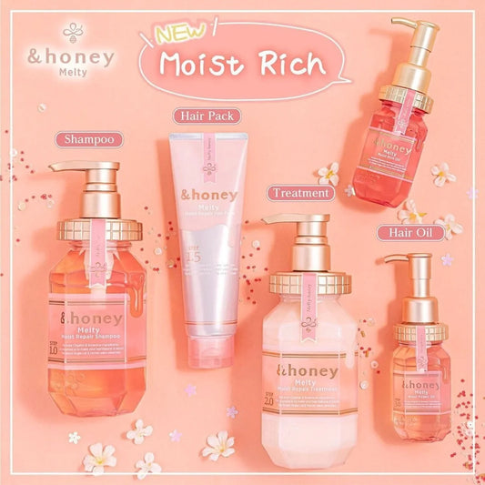 Set of &honey hair care products on a pink background