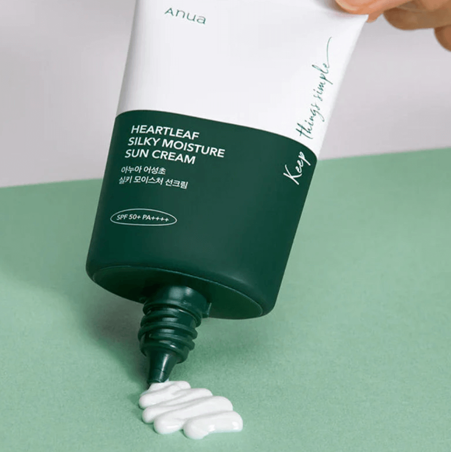 Anua Heartleaf Silky Moisture Sun Cream tube with sun cream squeezed out, showcasing luxurious skincare and SPF 50+ PA++++ protection.