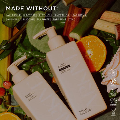 Two bottles of ARKIVE 'All Day Everyday' shampoo and conditioner with natural ingredients and certifications on a leafy background.