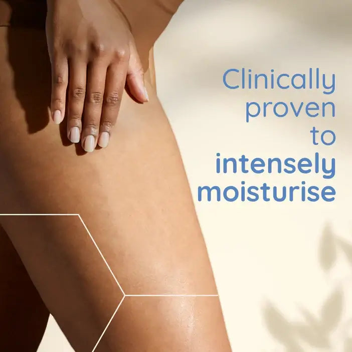 Close-up of a person's leg with a hand touching it, highlighting moisturized skin, with text 'Clinically proven to intensely moisturise' on a light background. Aveeno Skin Relief Body Oil Spray