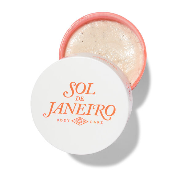 Sol de Janeiro Bom Dia Body Scrub 220g in a round container with a peach lid and creamy exfoliating texture.