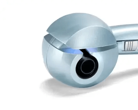 BaByliss Hydro-Fusion Anti-Frizz Curl Secret Automatic Hair Curler close-up view displaying ceramic curl chamber.