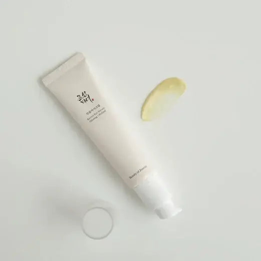 Beauty Of Joseon Revive Eye Serum 30ml tube with yellow product swatch on a light background.