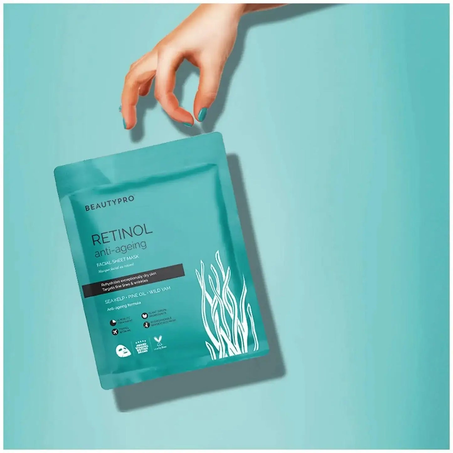 BeautyPro Retinol Anti-Ageing Facial Sheet Mask in hand, featuring ocean-derived ingredients for skin hydration and rejuvenation.