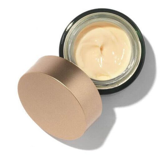 Biossance Squalane + Marine Algae Eye Cream in a jar showing creamy texture, designed for lifting and hydrating the eye area.