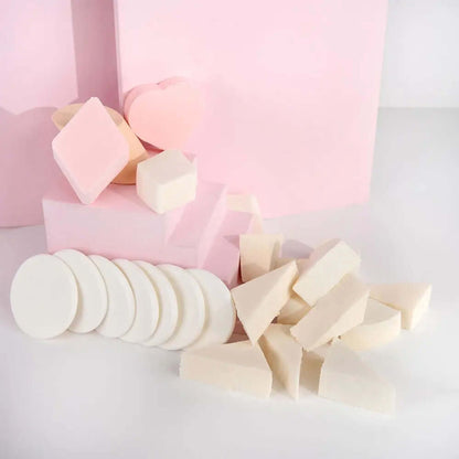 Brushworks assorted makeup sponges in various shapes and sizes, perfect for seamless application of makeup products.