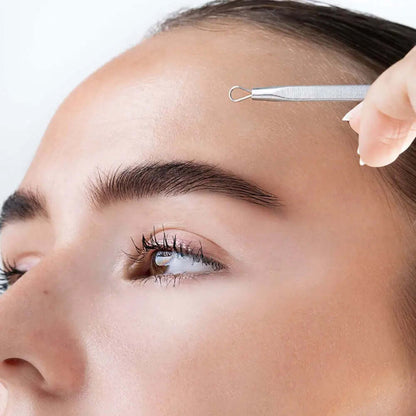 Model using Brushworks Blackhead and Blemish Remover Set tool for clear skin and blemish removal.