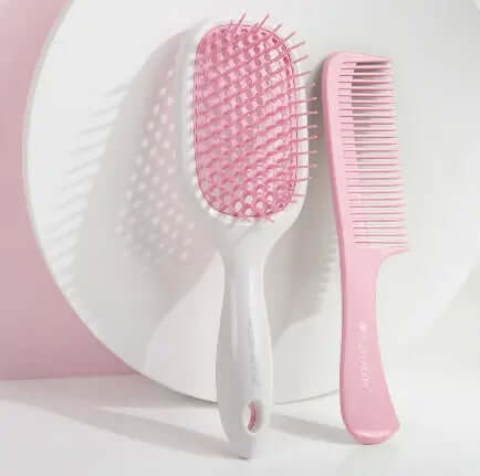Brushworks Blowdry Brush and Comb Set featuring a paddle brush and detangling comb on a light background.