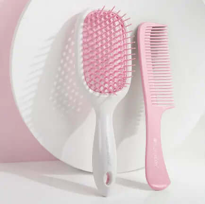 Brushworks Blowdry Brush and Comb Set featuring a paddle brush and detangling comb on a light background.