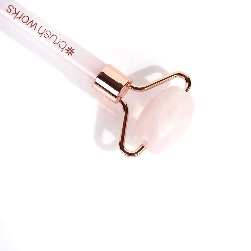 Brushworks Brazilian Rose Quartz Stone Roller with dual-end design for facial massage and skincare absorption.