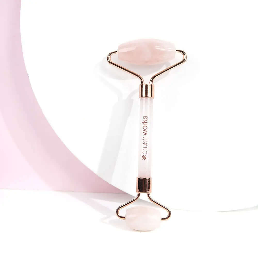 Brushworks Brazilian Rose Quartz Stone Roller for facial massage and skincare absorption.