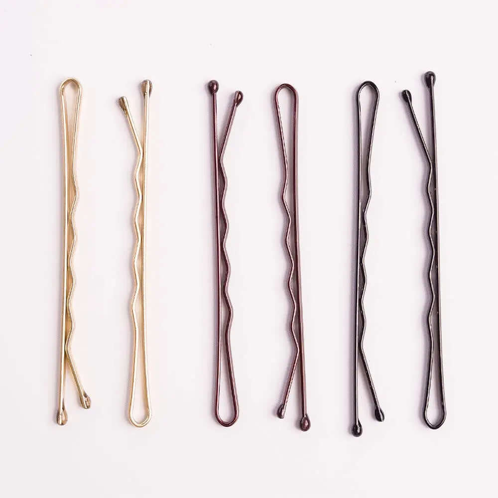 Brushworks Brown Bobby Pins assortment for brunette hair, providing secure hold and comfort for styling loose ends.