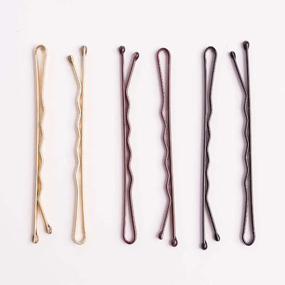 Brushworks Brown Bobby Pins assortment for brunette hair, providing secure hold and comfort for styling loose ends.