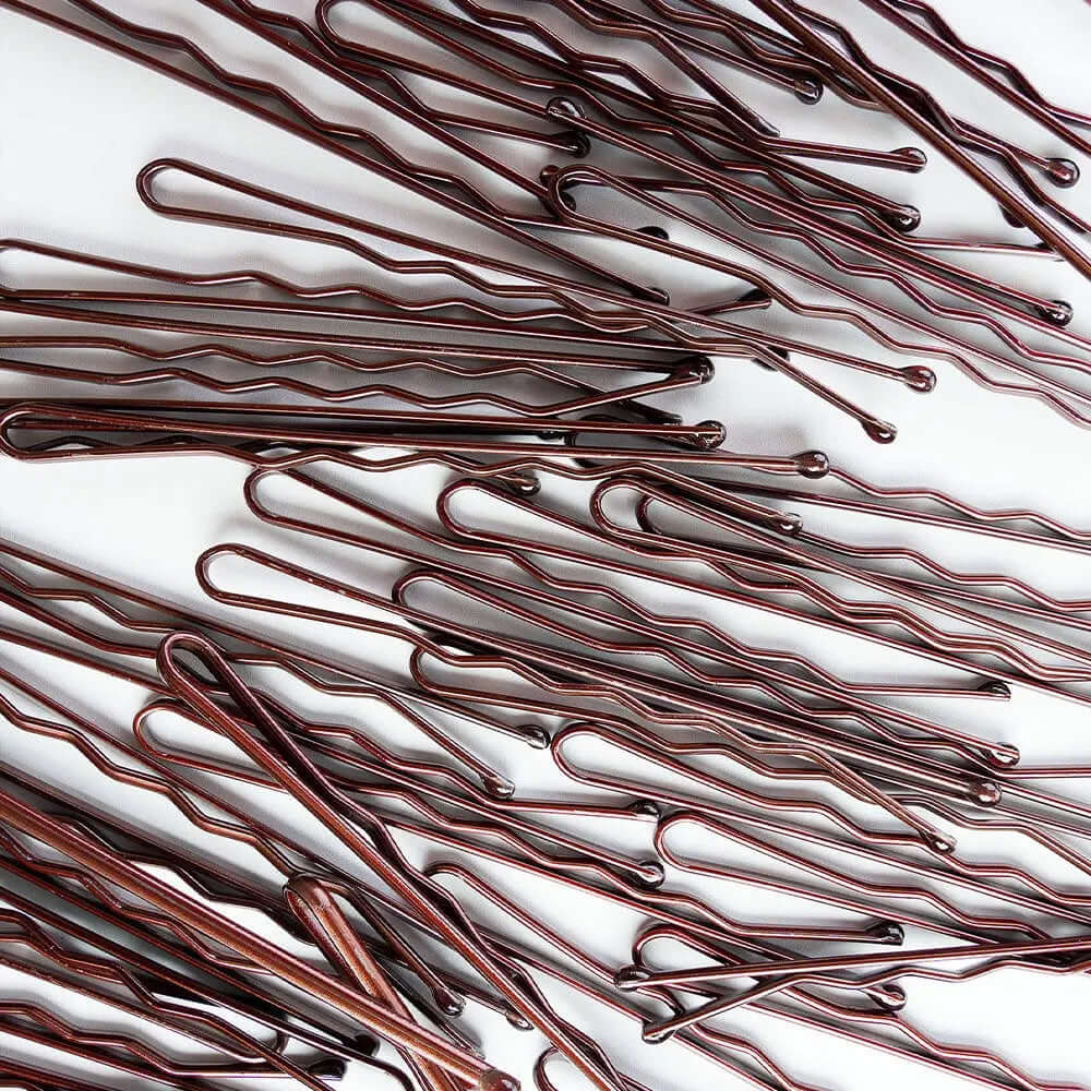 Brushworks Brown Bobby Pins ideal for brunette hair, providing a secure hold and keeping stray hairs in place.