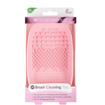 Brushworks Brush Cleaner Palette in pink, ergonomic design with textured surfaces for effective brush cleaning.