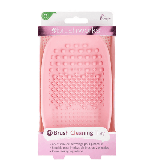 Brushworks Brush Cleaner Palette in pink, ergonomic design with textured surfaces for effective brush cleaning.