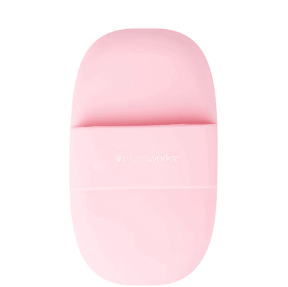 Brushworks Brush Cleaner Palette in soft pink, designed for effective brush cleaning with ergonomic grip and textured surfaces.