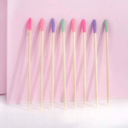 Brushworks Crystal Cuticle Sticks in eight vibrant colors, perfect for maintaining healthy nail beds and prepping for manicures.