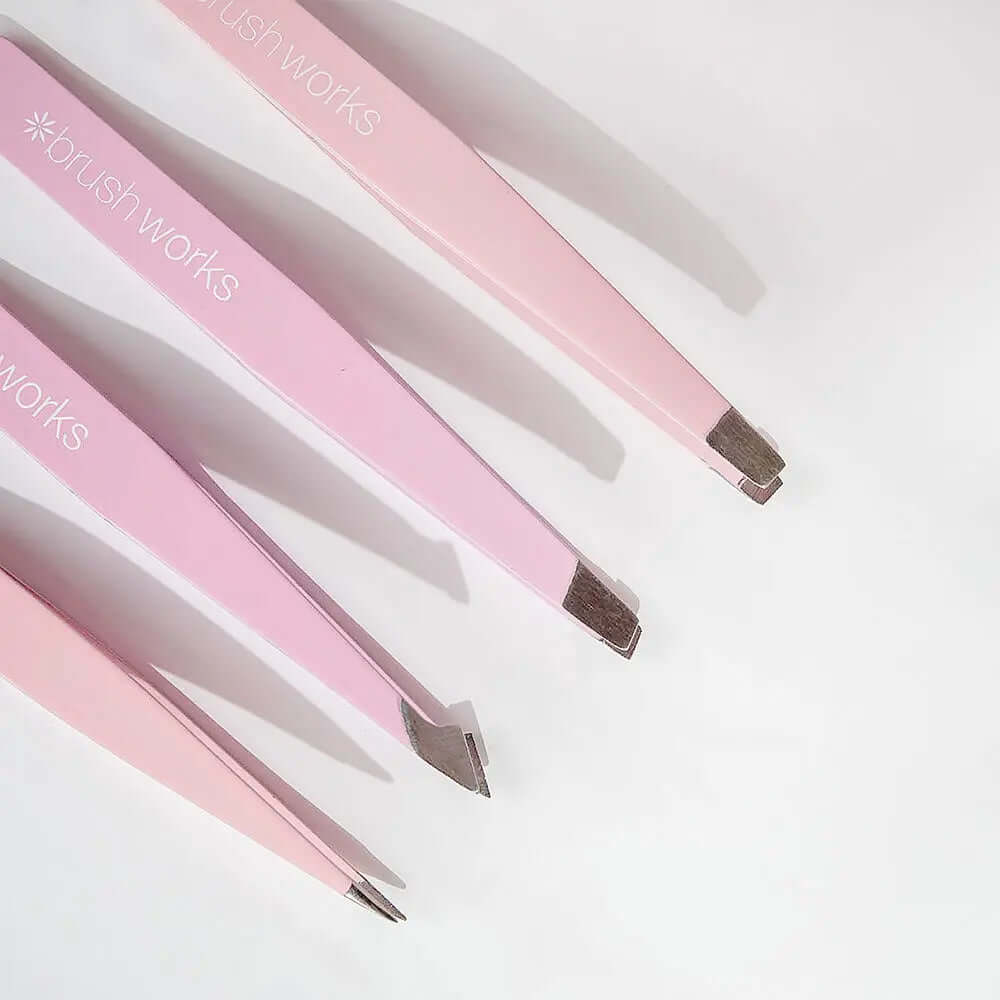 Brushworks HD 4 Piece Combination Tweezer Set in pink, featuring ergonomic design and stainless steel tips.