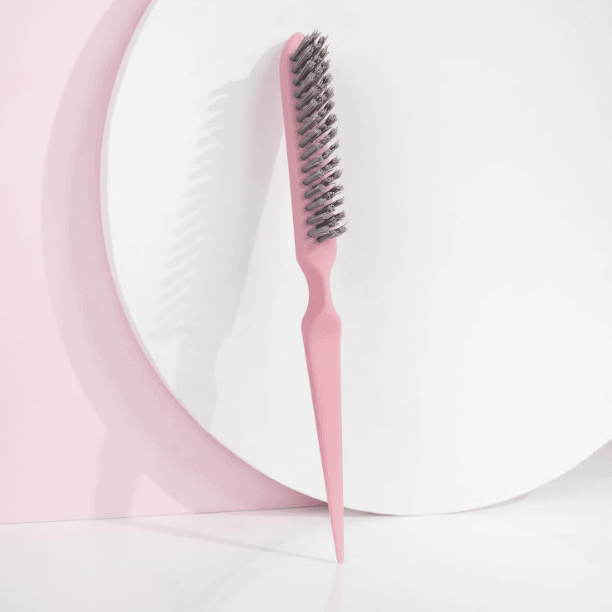 Brushworks HD Back Comb Brush in pink, featuring a slender pin tail and nylon bristles for easy hair sectioning and styling.