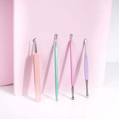 Brushworks HD Blackhead and Blemish Remover Set with pastel extraction tools on a pink background.
