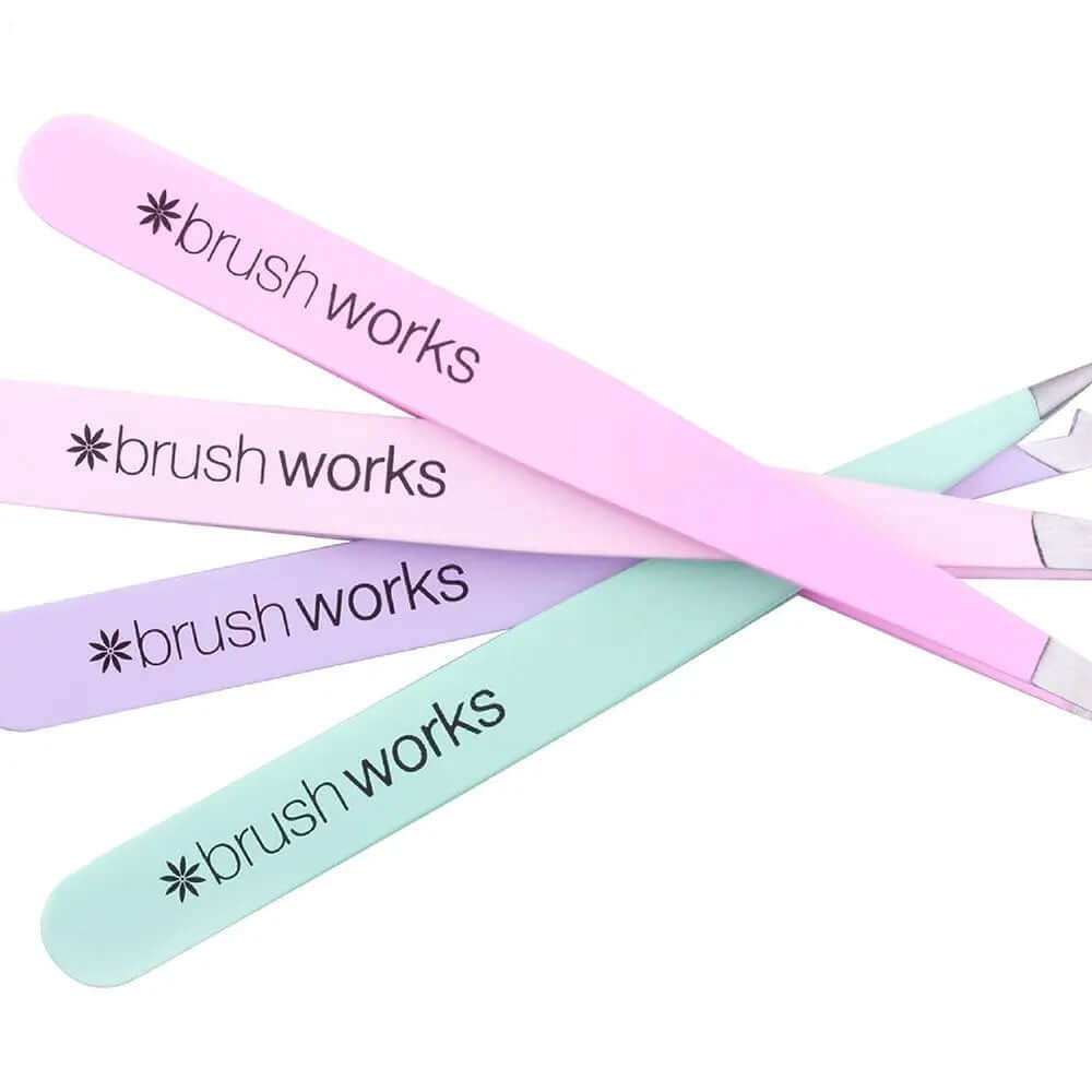 Brushworks HD Combination Tweezer Set in pastel colors for precise eyebrow grooming and shaping.