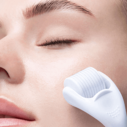 Close-up of a woman using Brushworks HD Micro Needle Derma Roller for smoother, firmer skin.
