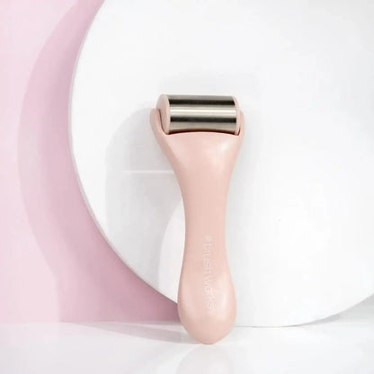 Brushworks Ice Roller on a white surface, designed to reduce puffiness and redness for a balanced complexion.