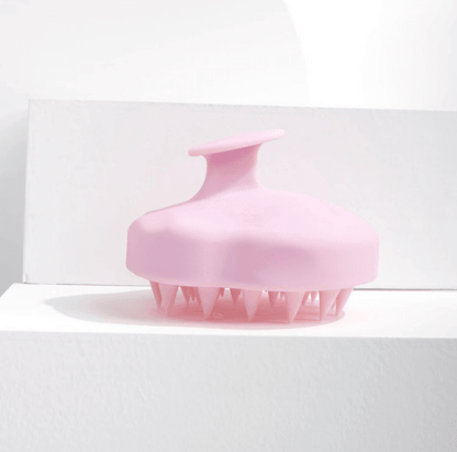 Brushworks Massaging Shampoo Brush in pink, designed for scalp exfoliation and hair growth stimulation.