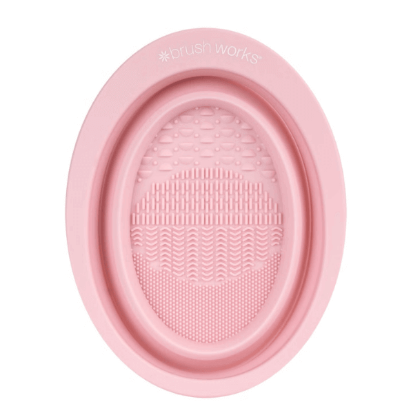 Brushworks Silicone Makeup Brush Cleaning Bowl with textured surface for deep cleaning, lightweight and foldable design.