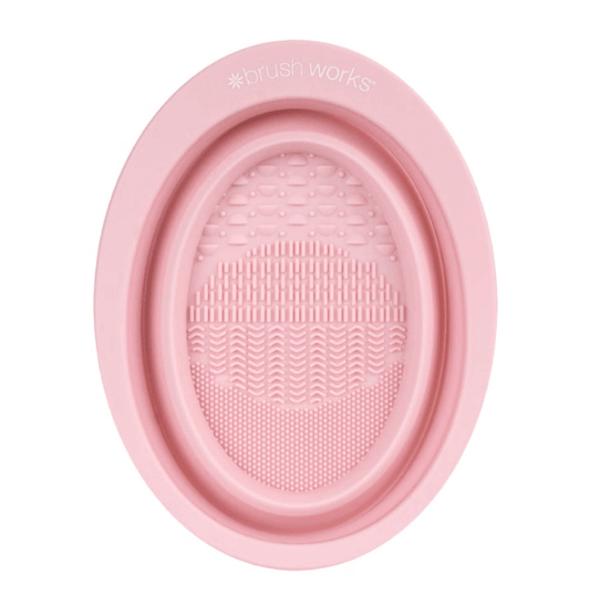 Brushworks Silicone Makeup Brush Cleaning Bowl with textured surface for deep cleaning, lightweight and foldable design.