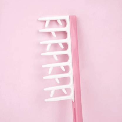Brushworks Smoothing Curl Comb in pink, designed for smooth curls and easy detangling with extra teeth for separation.
