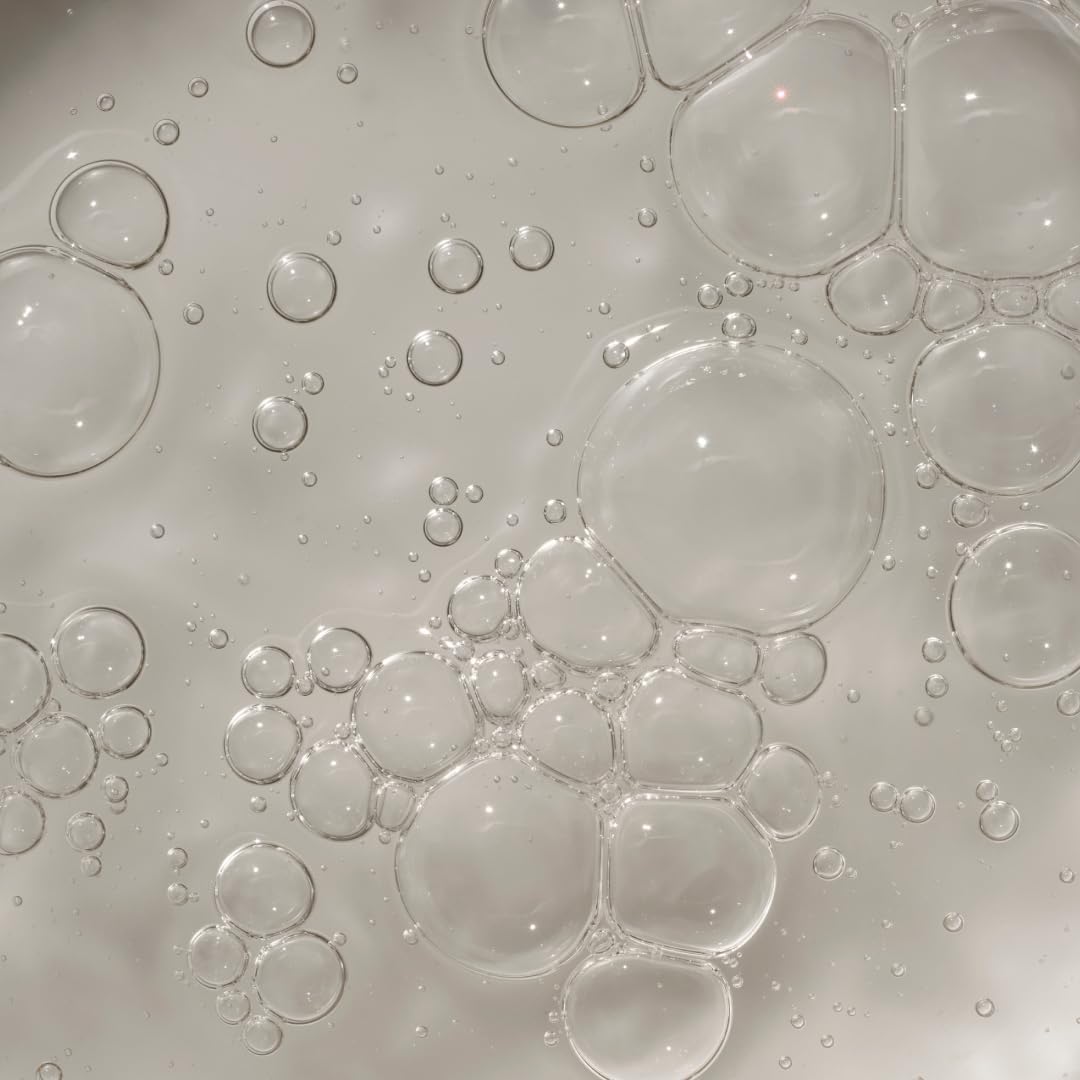 Close-up of ARKIVE transparent bubbles on a gray background