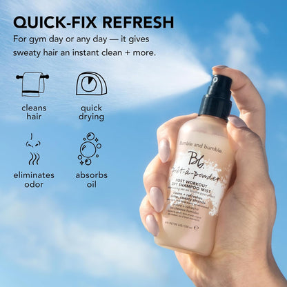 Hand holding a bottle of Bumble & Bumble product with a blue sky background