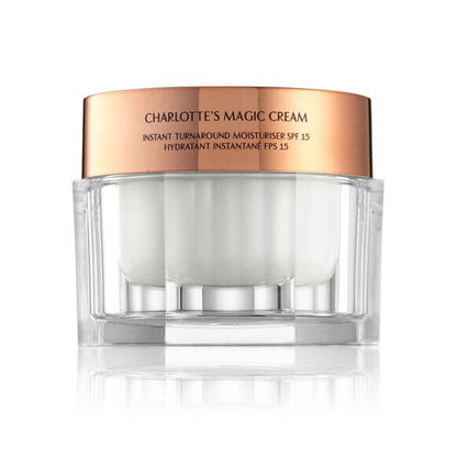 Charlotte Tilbury Charlotte's Magic Cream jar, a hydrating face moisturizer with SPF 15 for luminous skin.