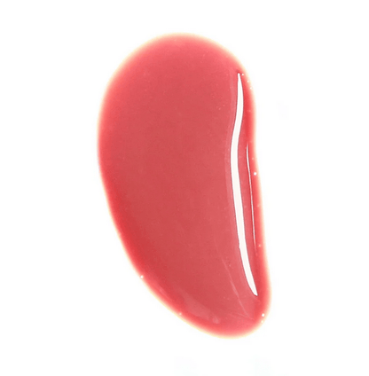 Swatch of Charlotte Tilbury Lip Lustre in Pillow Talk, a glossy nude-pink shade, showcasing its creamy texture.
