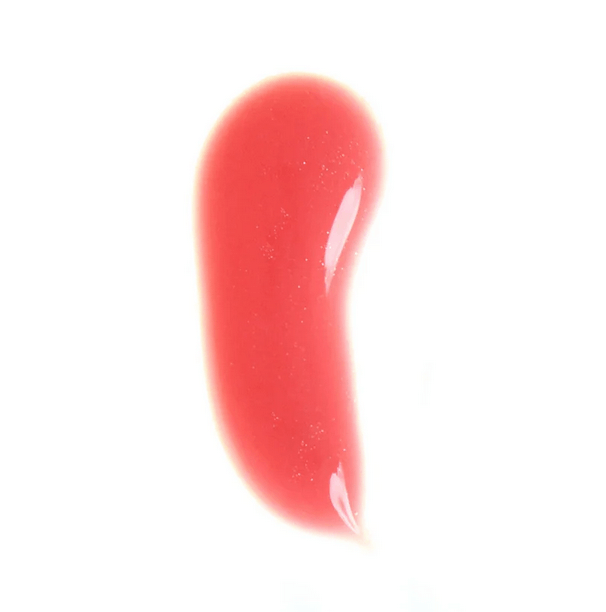 Swatch of Charlotte Tilbury Lip Lustre Pillow Talk in a glossy nude-pink shade, showcasing its creamy texture.