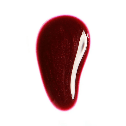 Swatch of deep burgundy lip gloss, showcasing a glossy, shiny finish with a creamy texture.