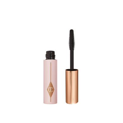 Charlotte Tilbury Push Up Lashes Travel Mascara 4ml, pink and gold tube with brush for long-lasting volume.