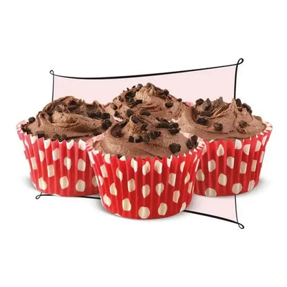 Delicious chocolate cupcakes in red polka dot liners topped with rich chocolate frosting and cookie crumbs.