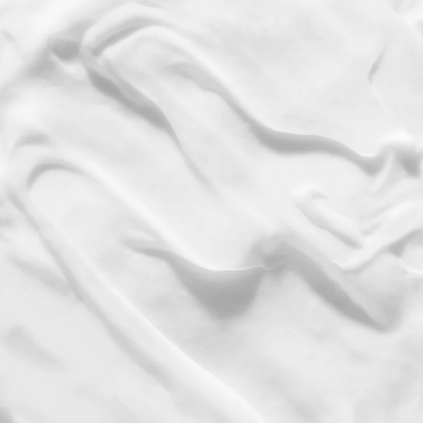 Close-up of the creamy texture of CHRISTOPHE ROBIN Hydrating Leave-in Cream with Aloe Vera for smooth, hydrated hair.