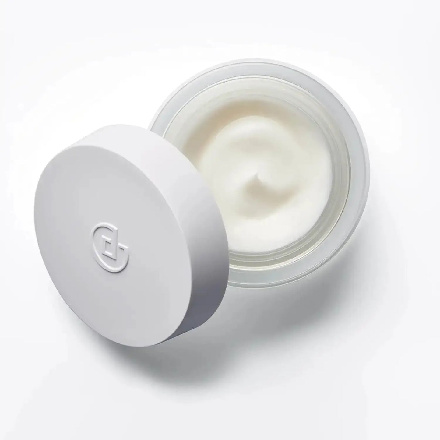 Collistar Vitamin C + Ferulic Acid Cream 50ml in a clear jar with a white lid, showcasing its creamy texture.