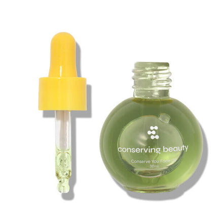 Conserving Beauty Conserve You Face Oil bottle and dropper, radiance-boosting plant-based skincare.
