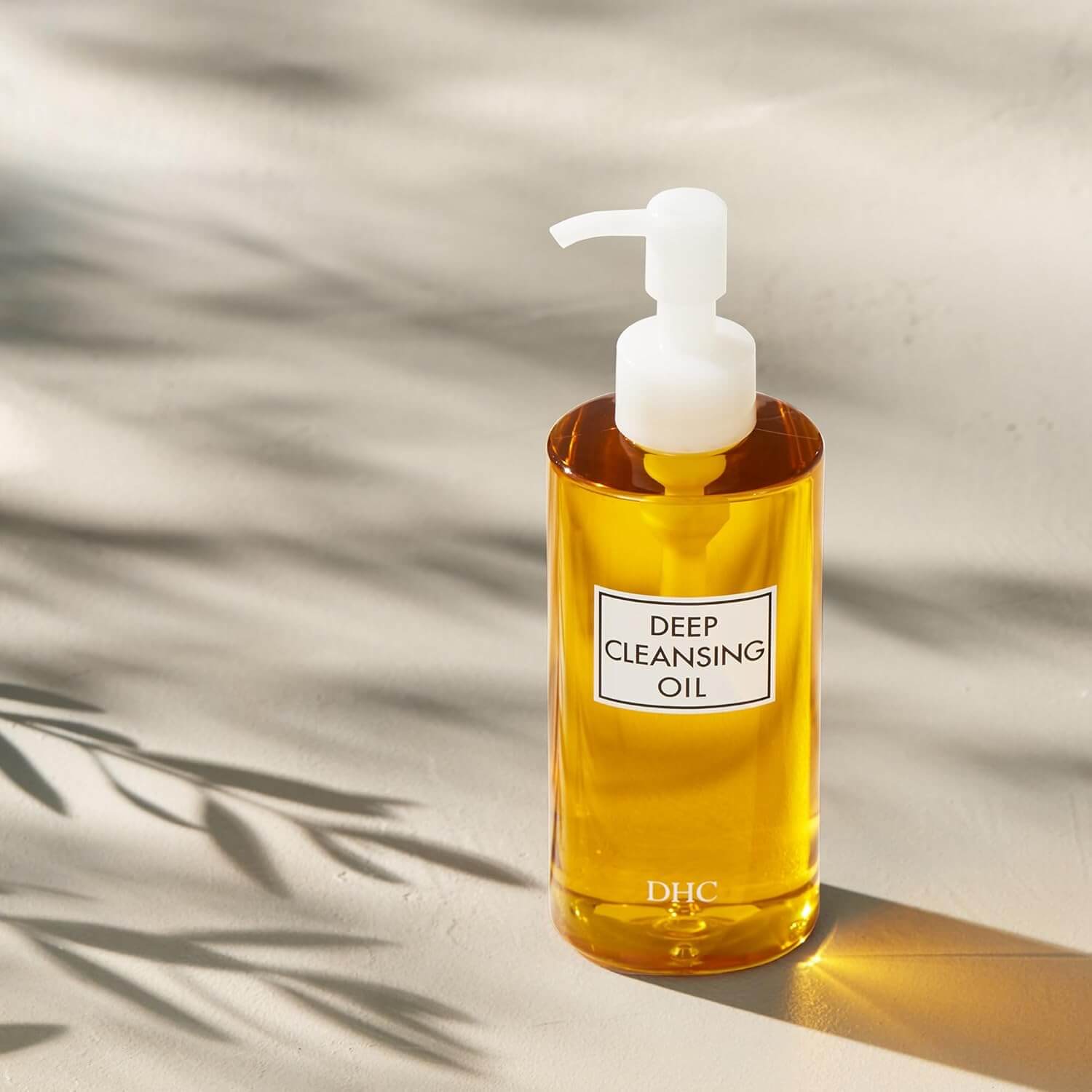 Bottle of DHC Deep Cleansing Oil on a neutral background