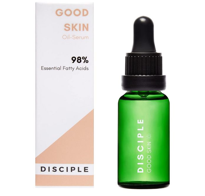 Green serum bottle with dropper labeled 'Disciple Good Skin' next to its packaging on a white background.